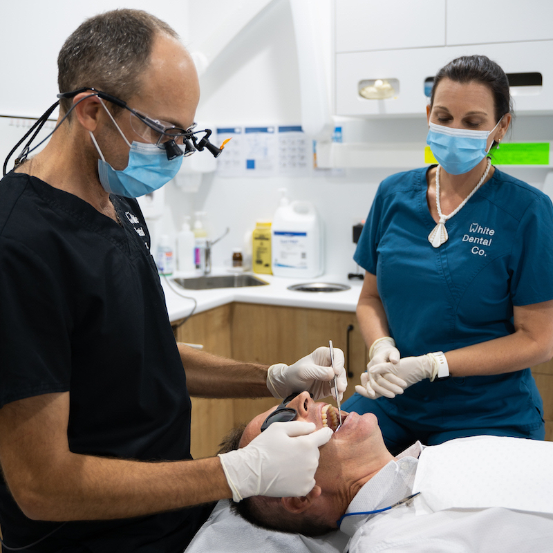 General dentist Dr Nick White and his assistant, Kelly, doing a checkup.