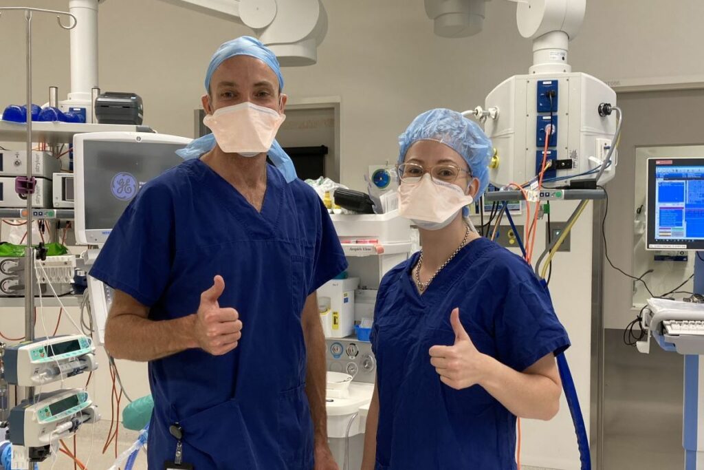 Dr Nick and dental assistant Lucy wear theatre gear in readiness to do a dental procedure in the operating theatre at St Stephen’s Hospital in Hervey Bay