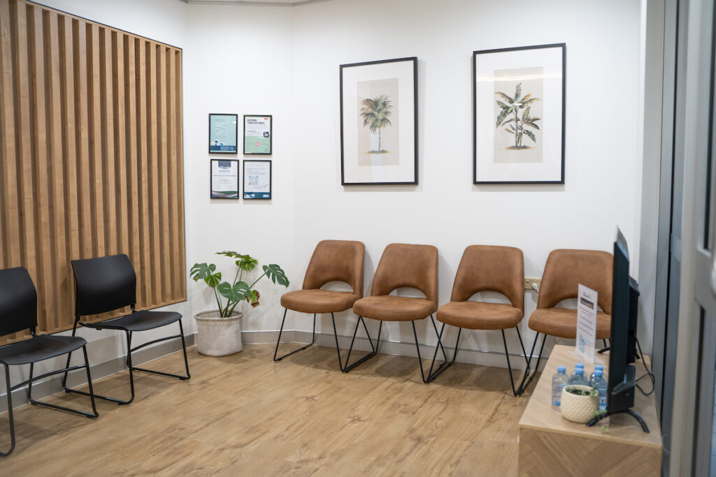Comfortable chairs in the reception area of White Dental Co.